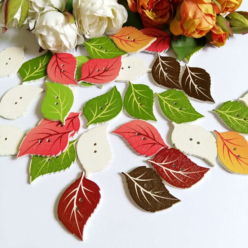 50Pcs น่ารักใบไม้ปุ่ม2หลุมเย็บ - Embellishments For Scrapbooking บทวิจารณ์และราคา